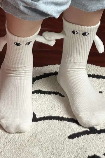 Hand Holding Socks